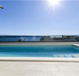 5 bedroom beachfront villa with heated pool near Omis, sleeps 9